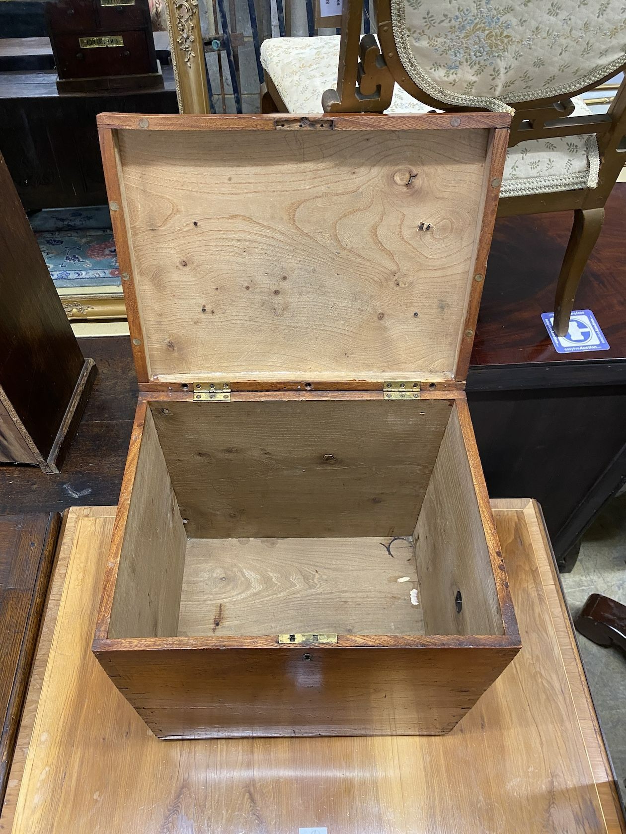 A 19th century elm trunk, width 45cm, depth 35cm, height 48cm